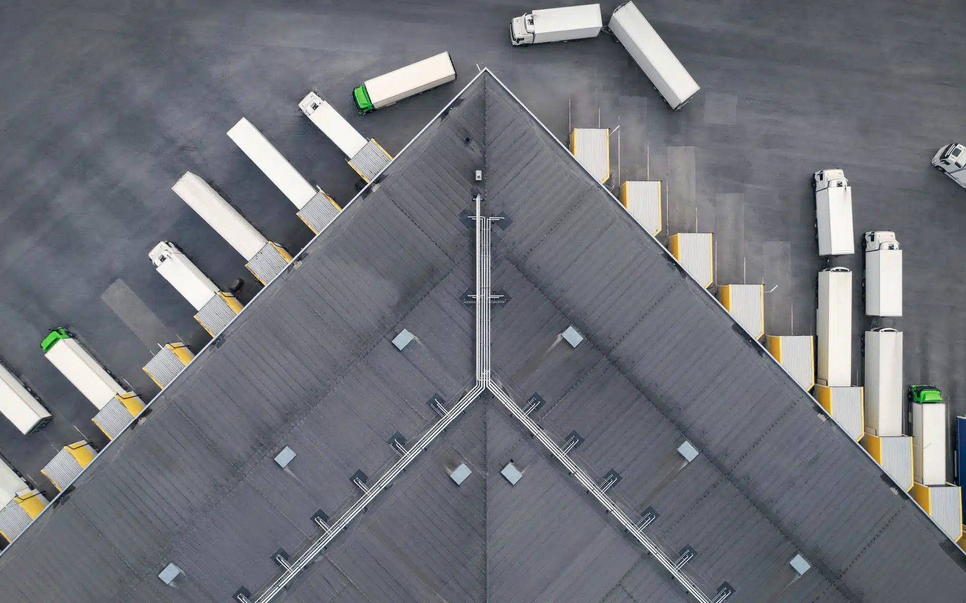 An overhead view of a semi truck terminal
